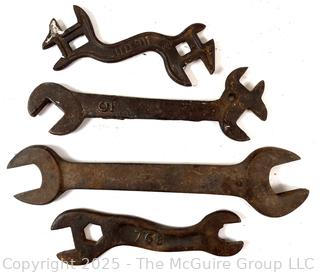 Grouping of 4 Vintage Cast Iron Open End Wrenches, Some w/ Stamped #'s <br>

<br><br>

Removal Options:<br><br> Sat (Nov 8) & Sun (Nov 9) 11-3pm, 56 Scotch Hill Rd., Cambridge NY 12816<br><br>

Sat (Nov 15) 12-2pm, TMG Warehouse, 2800 Juniper St., Fairfax, VA 22031<br><br>

Request Shipping (david@themcguiregroupllc.com)