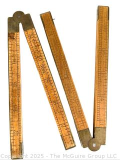 Seven (7) Folding Carpenters' Rulers<br><br>

<br><br>

Removal Options:<br><br> Sat (Nov 8) & Sun (Nov 9) 11-3pm, 56 Scotch Hill Rd., Cambridge NY 12816<br><br>

Sat (Nov 15) 12-2pm, TMG Warehouse, 2800 Juniper St., Fairfax, VA 22031<br><br>

Request Shipping (david@themcguiregroupllc.com)