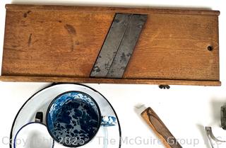 Kitchenware Including Meat Tenderizer, Ricer, Cheese Grater, Rolling Pin, Blue Swirl Graniteware Cup and Wooden Mandolin <br>

<br><br>

Removal Options:<br><br> Sat (Nov 8) & Sun (Nov 9) 11-3pm, 56 Scotch Hill Rd., Cambridge NY 12816<br><br>

Sat (Nov 15) 12-2pm, TMG Warehouse, 2800 Juniper St., Fairfax, VA 22031<br><br>

Request Shipping (david@themcguiregroupllc.com)