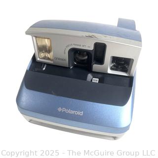 Polaroid Model ONE600 <br>

<br><br>

Removal Options:<br><br> Sat (Nov 8) & Sun (Nov 9) 11-3pm, 56 Scotch Hill Rd., Cambridge NY 12816<br><br>

Sat (Nov 15) 12-2pm, TMG Warehouse, 2800 Juniper St., Fairfax, VA 22031<br><br>

Request Shipping (david@themcguiregroupllc.com) 