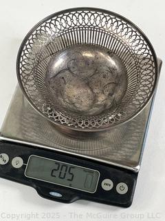 Servingware Including Sterling Weighted Candlesticks and Pierced Sterling Bowl <br>

<br><br>

Removal Options:<br><br> Sat (Nov 8) & Sun (Nov 9) 11-3pm, 56 Scotch Hill Rd., Cambridge NY 12816<br><br>

Sat (Nov 15) 12-2pm, TMG Warehouse, 2800 Juniper St., Fairfax, VA 22031<br><br>

Request Shipping (david@themcguiregroupllc.com)