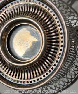 Servingware Including Sterling Weighted Candlesticks and Pierced Sterling Bowl <br>

<br><br>

Removal Options:<br><br> Sat (Nov 8) & Sun (Nov 9) 11-3pm, 56 Scotch Hill Rd., Cambridge NY 12816<br><br>

Sat (Nov 15) 12-2pm, TMG Warehouse, 2800 Juniper St., Fairfax, VA 22031<br><br>

Request Shipping (david@themcguiregroupllc.com)