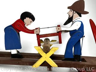 Folk Art Whirligig Man & Woman Sawing Wood.  Needs repair. 