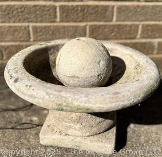 Cast Concrete Low Sphere Fountain. Some Cracks In Concrete