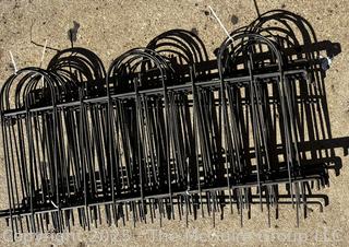 Stack of Metal Garden Fence Panels and Anchor Spikes.  Each Panel Measures 24 x 47"