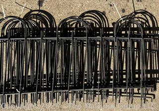 Stack of Metal Garden Fence Panels and Anchor Spikes.  Each Panel Measures 24 x 47"