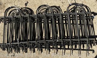 Stack of Metal Garden Fence Panels and Anchor Spikes.  Each Panel Measures 24 x 47"