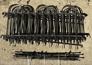 Stack of Metal Garden Fence Panels and Anchor Spikes.  Each Panel Measures 24 x 47"