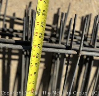 Stack of Metal Garden Fence Panels and Anchor Spikes.  Each Panel Measures 24 x 47"