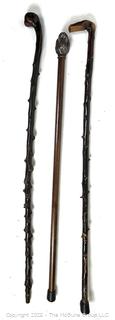 Three (3) Walking Sticks Including Blackthorn Shillelaghs and Dog Head Handle Cane