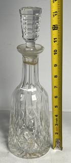 Three (3) Liquor Decanters Including one Waterford