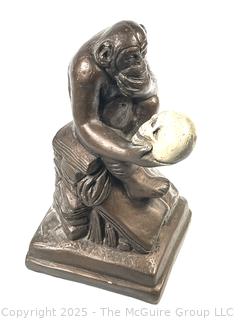 Darwin Monkey with Skull Sculpture