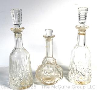 Three (3) Liquor Decanters Including one Waterford