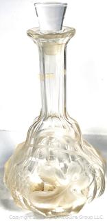Three (3) Liquor Decanters Including one Waterford