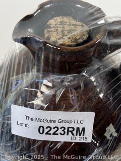 Slip Glaze Stoneware Whiskey Jug Marked E<br><br>Mick and Christina

<br><br>

Removal Options:<br><br> Sat (Nov 8) & Sun (Nov 9) 11-3pm, 56 Scotch Hill Rd., Cambridge NY 12816<br><br>

Sat (Nov 15) 12-2pm, TMG Warehouse, 2800 Juniper St., Fairfax, VA 22031<br><br>

Request Shipping (david@themcguiregroupllc.com)