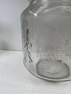 Planters Mr. Peanut Clear Glass Jar Pennant Salted Peanuts 5₵ w/ Top. 7"D x 12”Tall. Note Chip in Rim of Cover<br><br>House

<br><br>

Removal Options:<br><br> Sat (Nov 8) & Sun (Nov 9) 11-3pm, 56 Scotch Hill Rd., Cambridge NY 12816<br><br>

Sat (Nov 15) 12-2pm, TMG Warehouse, 2800 Juniper St., Fairfax, VA 22031<br><br>

Request Shipping (david@themcguiregroupllc.com) 