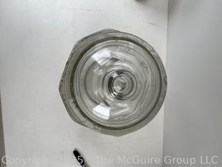 Planters Mr. Peanut Clear Glass Jar Pennant Salted Peanuts 5₵ w/ Top. 7"D x 12”Tall. Note Chip in Rim of Cover<br><br>House

<br><br>

Removal Options:<br><br> Sat (Nov 8) & Sun (Nov 9) 11-3pm, 56 Scotch Hill Rd., Cambridge NY 12816<br><br>

Sat (Nov 15) 12-2pm, TMG Warehouse, 2800 Juniper St., Fairfax, VA 22031<br><br>

Request Shipping (david@themcguiregroupllc.com) 