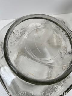 Planters Mr. Peanut Clear Glass Jar Pennant Salted Peanuts 5₵ w/ Top. 7"D x 12”Tall. Note Chip in Rim of Cover<br><br>House

<br><br>

Removal Options:<br><br> Sat (Nov 8) & Sun (Nov 9) 11-3pm, 56 Scotch Hill Rd., Cambridge NY 12816<br><br>

Sat (Nov 15) 12-2pm, TMG Warehouse, 2800 Juniper St., Fairfax, VA 22031<br><br>

Request Shipping (david@themcguiregroupllc.com) 