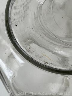 Planters Mr. Peanut Clear Glass Jar Pennant Salted Peanuts 5₵ w/ Top. 7"D x 12”Tall. Note Chip in Rim of Cover<br><br>House

<br><br>

Removal Options:<br><br> Sat (Nov 8) & Sun (Nov 9) 11-3pm, 56 Scotch Hill Rd., Cambridge NY 12816<br><br>

Sat (Nov 15) 12-2pm, TMG Warehouse, 2800 Juniper St., Fairfax, VA 22031<br><br>

Request Shipping (david@themcguiregroupllc.com) 