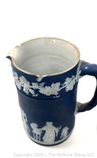 Two (2) English Wedgwood Cobalt Blue Jasperware Jugs<br><br>Wendy Dan Hermione

<br><br>

Removal Options:<br><br> Sat (Nov 8) & Sun (Nov 9) 11-3pm, 56 Scotch Hill Rd., Cambridge NY 12816<br><br>

Sat (Nov 15) 12-2pm, TMG Warehouse, 2800 Juniper St., Fairfax, VA 22031<br><br>

Request Shipping (david@themcguiregroupllc.com)