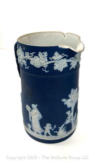 Two (2) English Wedgwood Cobalt Blue Jasperware Jugs<br><br>Wendy Dan Hermione

<br><br>

Removal Options:<br><br> Sat (Nov 8) & Sun (Nov 9) 11-3pm, 56 Scotch Hill Rd., Cambridge NY 12816<br><br>

Sat (Nov 15) 12-2pm, TMG Warehouse, 2800 Juniper St., Fairfax, VA 22031<br><br>

Request Shipping (david@themcguiregroupllc.com)