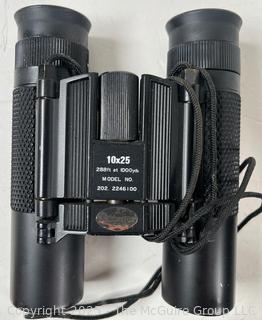 Two (2) Pair of Binoculars Including Swift Triton 7 x 35. Model No. 748<br><br>Mick & Christina

<br><br>

Removal Options:<br><br> Sat (Nov 8) & Sun (Nov 9) 11-3pm, 56 Scotch Hill Rd., Cambridge NY 12816<br><br>

Sat (Nov 15) 12-2pm, TMG Warehouse, 2800 Juniper St., Fairfax, VA 22031<br><br>

Request Shipping (david@themcguiregroupllc.com) 
