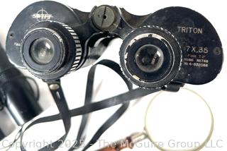 Two (2) Pair of Binoculars Including Swift Triton 7 x 35. Model No. 748<br><br>Mick & Christina

<br><br>

Removal Options:<br><br> Sat (Nov 8) & Sun (Nov 9) 11-3pm, 56 Scotch Hill Rd., Cambridge NY 12816<br><br>

Sat (Nov 15) 12-2pm, TMG Warehouse, 2800 Juniper St., Fairfax, VA 22031<br><br>

Request Shipping (david@themcguiregroupllc.com) 