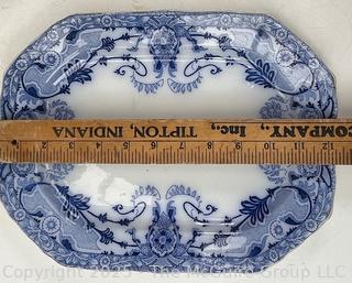 Two (2) Porcelain Flow Blue Transferware Platters, Including Wedgewood and Raleigh by Burgess & Leich.<br><br>House<br><br>

<br><br>

Removal Options:<br><br> Sat (Nov 8) & Sun (Nov 9) 11-3pm, 56 Scotch Hill Rd., Cambridge NY 12816<br><br>

Sat (Nov 15) 12-2pm, TMG Warehouse, 2800 Juniper St., Fairfax, VA 22031<br><br>

Request Shipping (david@themcguiregroupllc.com)