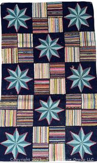 Hand Hooked Rug in Star and Block Pattern on Black Ground. Measures 24 x 38"<br><br>David & Katherine

<br><br>

Removal Options:<br><br> Sat (Nov 8) & Sun (Nov 9) 11-3pm, 56 Scotch Hill Rd., Cambridge NY 12816<br><br>

Sat (Nov 15) 12-2pm, TMG Warehouse, 2800 Juniper St., Fairfax, VA 22031<br><br>

Request Shipping (david@themcguiregroupllc.com)