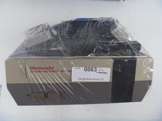 Nintendo NES Console & Accessories.  Untested, power lights up.  Toy