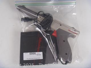 Nintendo Shooter and Two (2) Software Cartridges