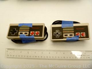 Nintendo NES Console & Accessories.  Untested, power lights up.  Toy