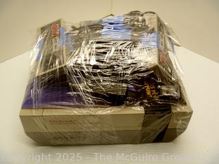 Nintendo NES Console & Accessories.  Untested, power lights up.  Toy