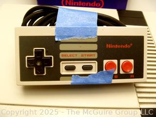 Nintendo NES Console & Accessories.  Untested, power lights up.  Toy