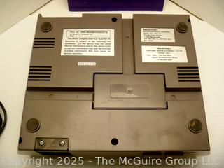 Nintendo NES Console & Accessories.  Untested, power lights up.  Toy