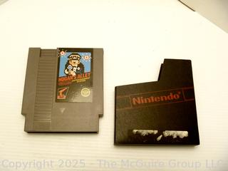 Nintendo Shooter and Two (2) Software Cartridges