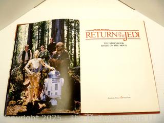 Two (2) Books, Including Return of the Jedi and E.T. 