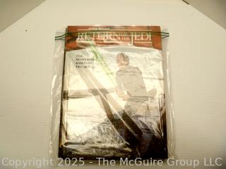 Two (2) Books, Including Return of the Jedi and E.T. 