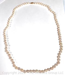 Knotted Pearl Necklace with 14kt Yellow Gold Clasp.  24"