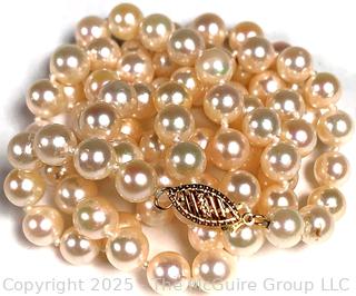 Knotted Pearl Necklace with 14kt Yellow Gold Clasp.  24"