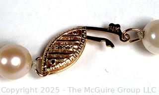 Knotted Pearl Necklace with 14kt Yellow Gold Clasp.  24"