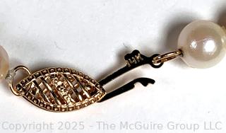 Knotted Pearl Necklace with 14kt Yellow Gold Clasp.  24"