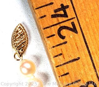 Knotted Pearl Necklace with 14kt Yellow Gold Clasp.  24"