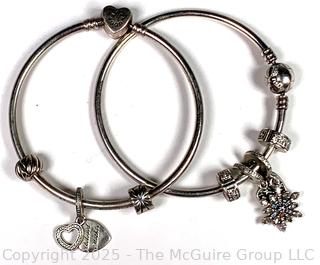 Two (2) Sterling Silver Bangle Bracelets with Charms