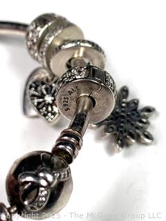 Two (2) Sterling Silver Bangle Bracelets with Charms
