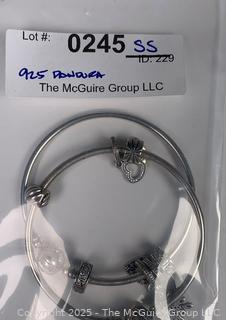 Two (2) Sterling Silver Bangle Bracelets with Charms