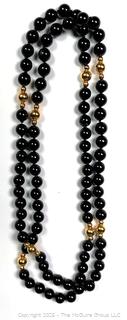 Onxy Opera Length Bead Necklace with Gold Bead Spacers