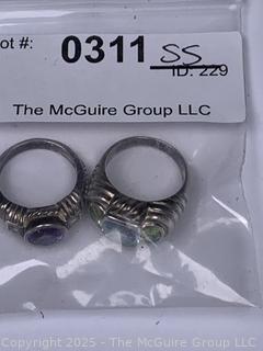 Two (2) Judith Ripka Sterling Silver Rings Including Bezel Amethyst and Blue Topaz with Peridot
