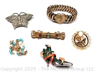 Six (6) Brooches and Bracelet