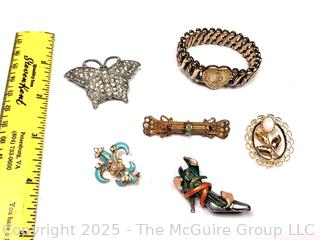 Six (6) Brooches and Bracelet